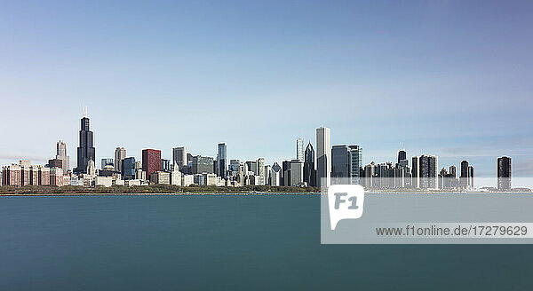 Downtown seen from Northerly Island against blue sky  Chicago  USA
