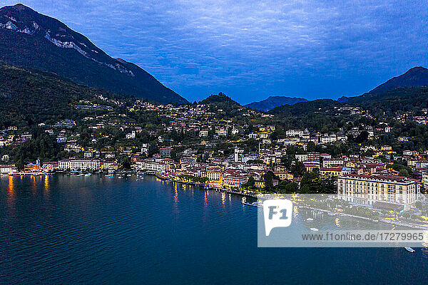 Italy  Province of Como  Menaggio  Helicopter view of town on shore of Lake Como at dawn