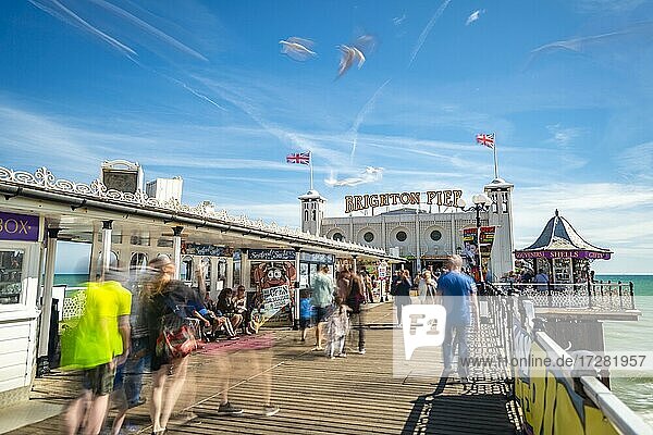 Tourists at Brighton Palace Pier with seagulls  long exposure  Brighton  East Sussex  England  United Kingdom  Europe