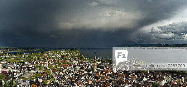 Germany  Baden Wurttemberg  Radolfzell  Aerial view of old town over Lake Constance during thunderstorm