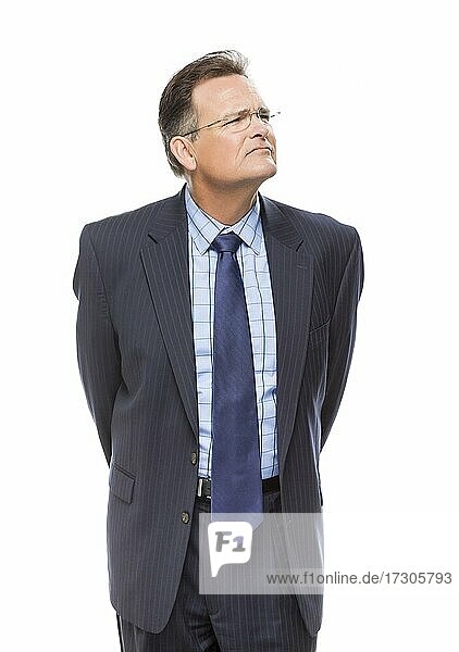 Handsome businessman looking up and over isolated on a white background