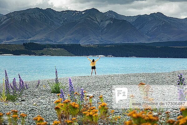 Guy at a beach at Lake Tekapo  Canterbury region  Mackenzie District  South Island  New Zealand  Oceania