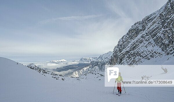 Young man on ski tour  ski tourer  Wetterstein Mountains  Garmisch-Partenkirchen  Bavaria  Germany  Europe