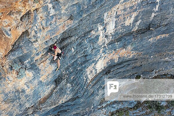 Climber climbing on a rock face  sport climbing  Telendos  near Kalymnos  Dodecanese  Greece  Europe