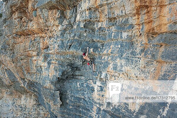 Climber climbing on a rock face  sport climbing  Telendos  near Kalymnos  Dodecanese  Greece  Europe