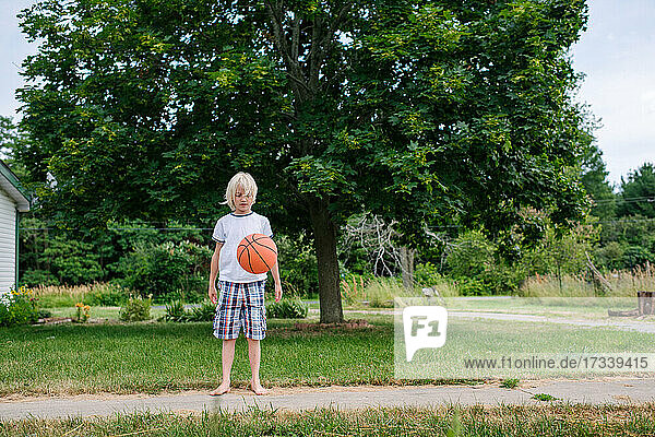 Canada  Ontario  Kingston  Boy (8-9) playing basketball