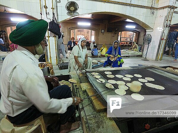 Preparation of bread for mass feeding  Bangla Sahib Gurudwara Sikh Temple  Delhi  India  Asia