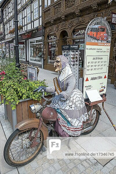 Witch figure on an old moped as an advertising medium for the castle railway  Wernigerode  Saxony-Anhalt  Germany  Europe