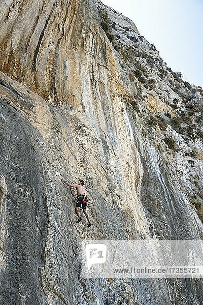 Climbing on a rock face  lead climbing  sport climbing  Kalymnos  Dodecanese  Greece  Europe
