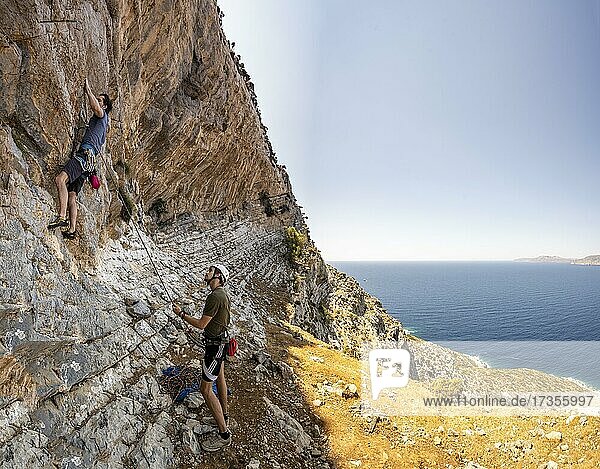 Climbing a rock face  belaying  lead climbing  sport climbing  Kalymnos  Dodecanese  Greece  Europe