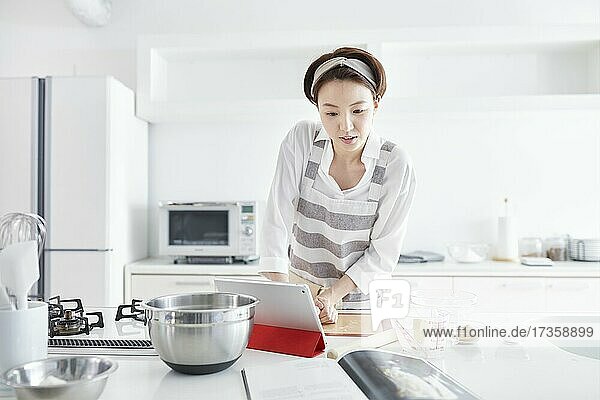 Japanese woman cooking at home