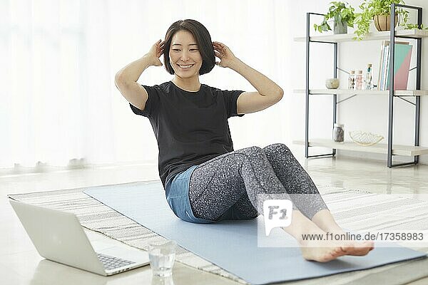 Japanese woman training at home