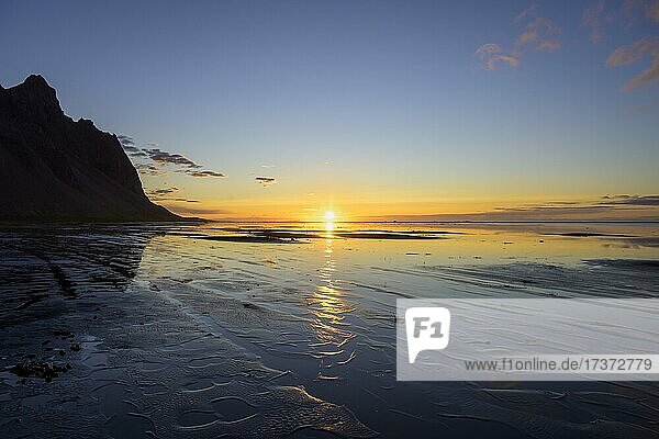 Sunrise on the beach over the sea  Vestrahorn  Klifatindur  Höfn  Austurland  Iceland  Europe