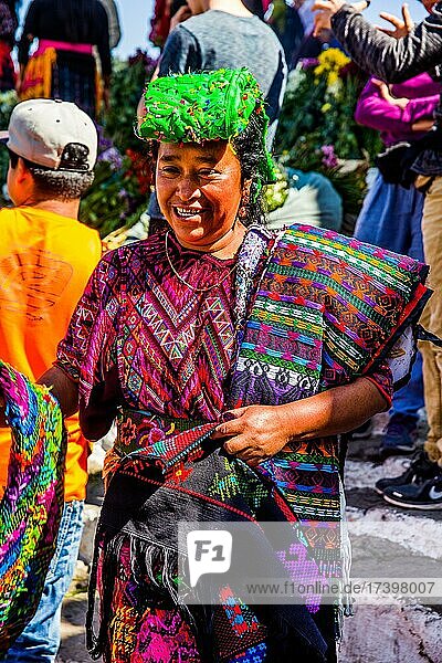 Textile seller  most important market in the highlands  Chichicastenango  Chichicastenango  Guatemala  Central America
