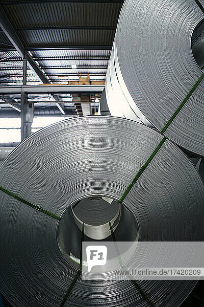 Metal sheet rolls at steel mill