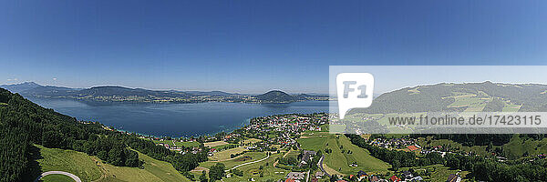 Austria  Upper Austria  Weyregg am Attersee  Drone panorama of small town on shore of Lake Atter