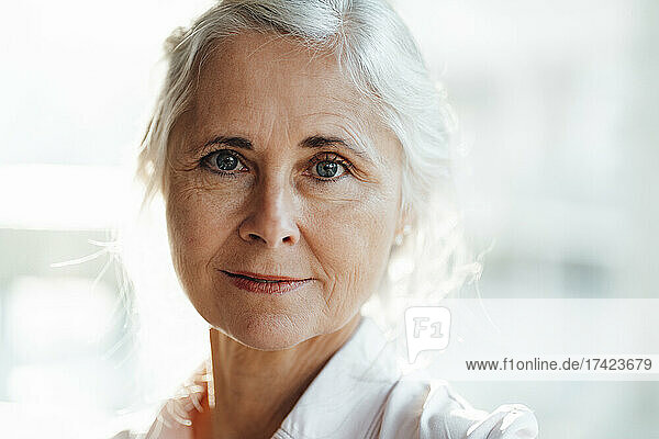 Mature woman in cafe