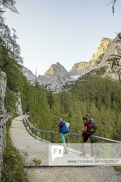 Two hikers on the ascent  hiking to the Hochkalter  Berchtesgaden Alps  Berchtesgadener Land  Upper Bavaria  Bavaria  Germany  Europe