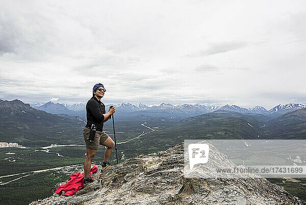 USA  Alaska  Female hiker on mountain top in Denali National Park