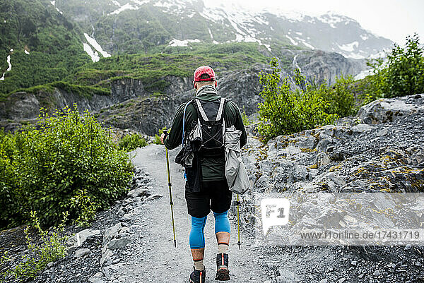 USA  Alaska  Rear view of hiker on footpath in Denali National Park