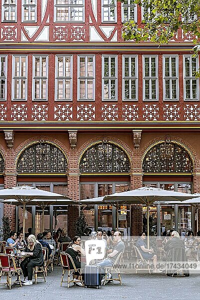 Reconstructed Renaissance half-timbered house  Goldene Waage coffee house with street café  New Frankfurt Old Town  Dom-Römer district  Frankfurt am Main  Hesse  Germany  Europe