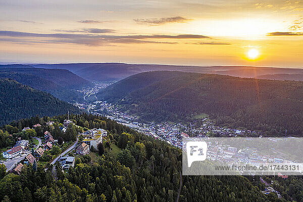 Germany  Baden-Wurttemberg  Bad Wildbad  Aerial view of town in Black Forest at summer sunset