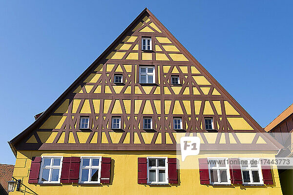 Germany  Bavaria  Dinkelsbuhl  Exterior of yellow painted half-timbered house