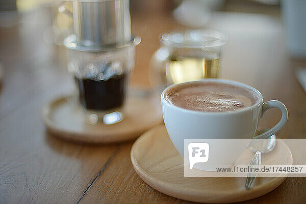 Hot Chocolate mugs on rustic wooden table