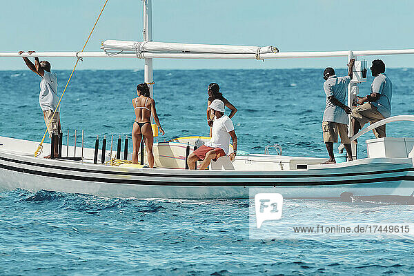 Boat with surfers in Indian Ocean