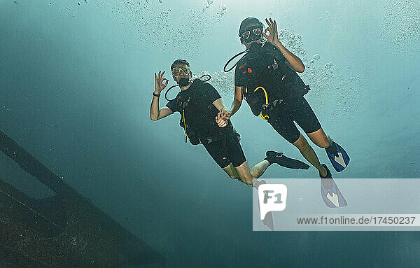 divers on honeymoon exploring the tropical waters around Phuket