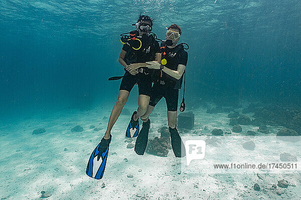 divers on honeymoon exploring the tropical waters around Phuket