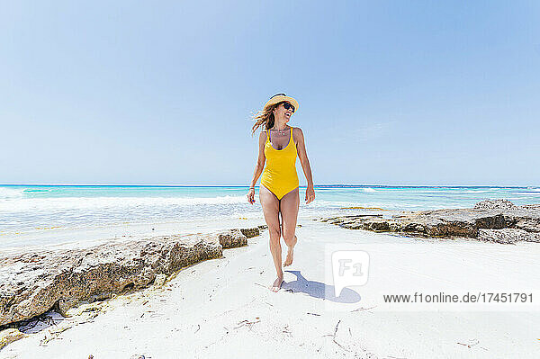 Woman on vacation on the island of Formentera Spain