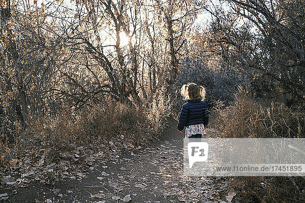 Young girl exploring in a park  Colorado