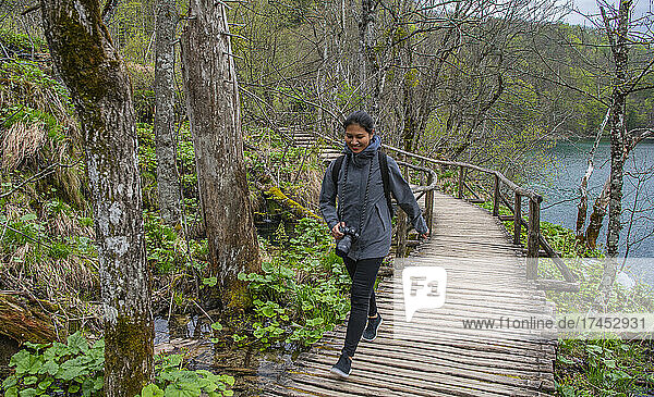 Woman exploring the Plitvice lakes national park