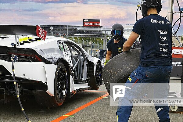 Pit crew practising wheel change and refuelling on the Lamborgini Huracan GT3 Evo DTM race car of German Touring Car driver Esteban Muth at Norisring city circuit  temporary car race track at Dutzendteich  former Nazi Party Rally Grounds  Nuremberg  Franconia  Middle Franconia  Bavaria  Germany  Europe