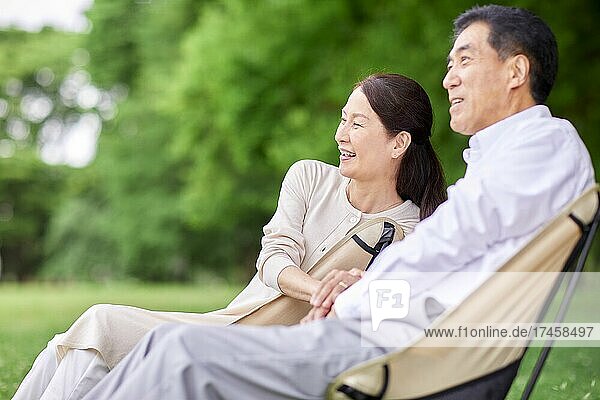 Japanese senior couple at a city park