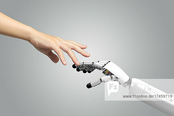 Composite image of robot interaction with human
