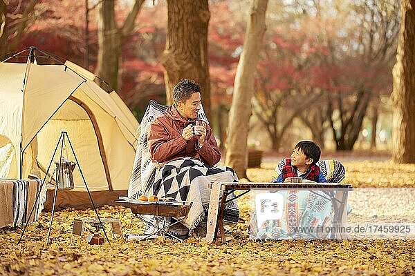 Japanese family at campsite