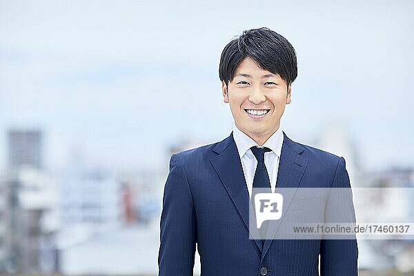 Japanese businessman portrait outdoors