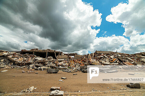View of broken wall of built structure against cloudy sky  Villa Epecuen
