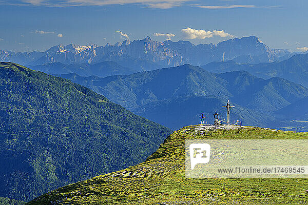 Woman standing at mountain edge in Carinthia  Austria
