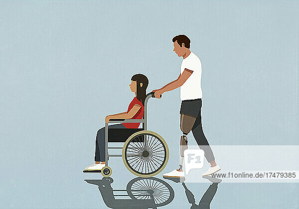 Amputee husband pushing wife in wheelchair