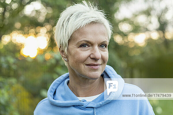 Close up portrait beautiful woman with short blonde hair