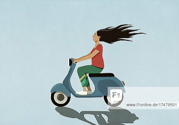 Unbekümmerte Frau fährt Motorroller