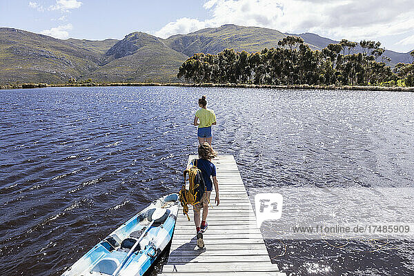 Children on boat launch  Stanford Valley Guest Farm  Stanford  Western Cape  South Africa.