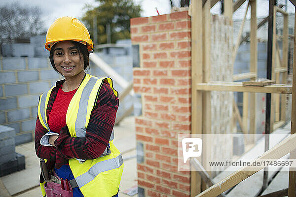 Portrait confident female construction site at construction site