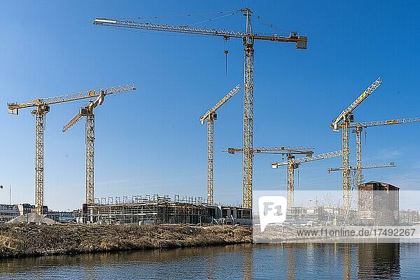 Construction cranes at the Europacity developing area on Berlin's Landwehrkanal  Berlin  Germany  Europe