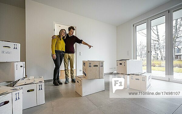 Young couple moves into an empty flat  flat move  Germany  Europe
