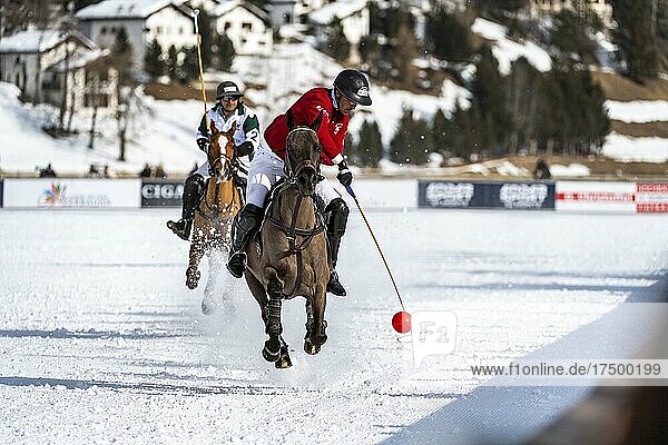 Max Charlton of Team St. Moritz hits the red ball in a flying gallop  36th Snow Polo World Cup St. Moritz 2020  Lake St. Moritz  St. Moritz  Grisons  Switzerland  Europe