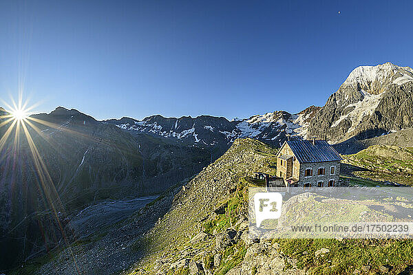 Hintergrathutte refuge in Ortler Alps at sunrise
